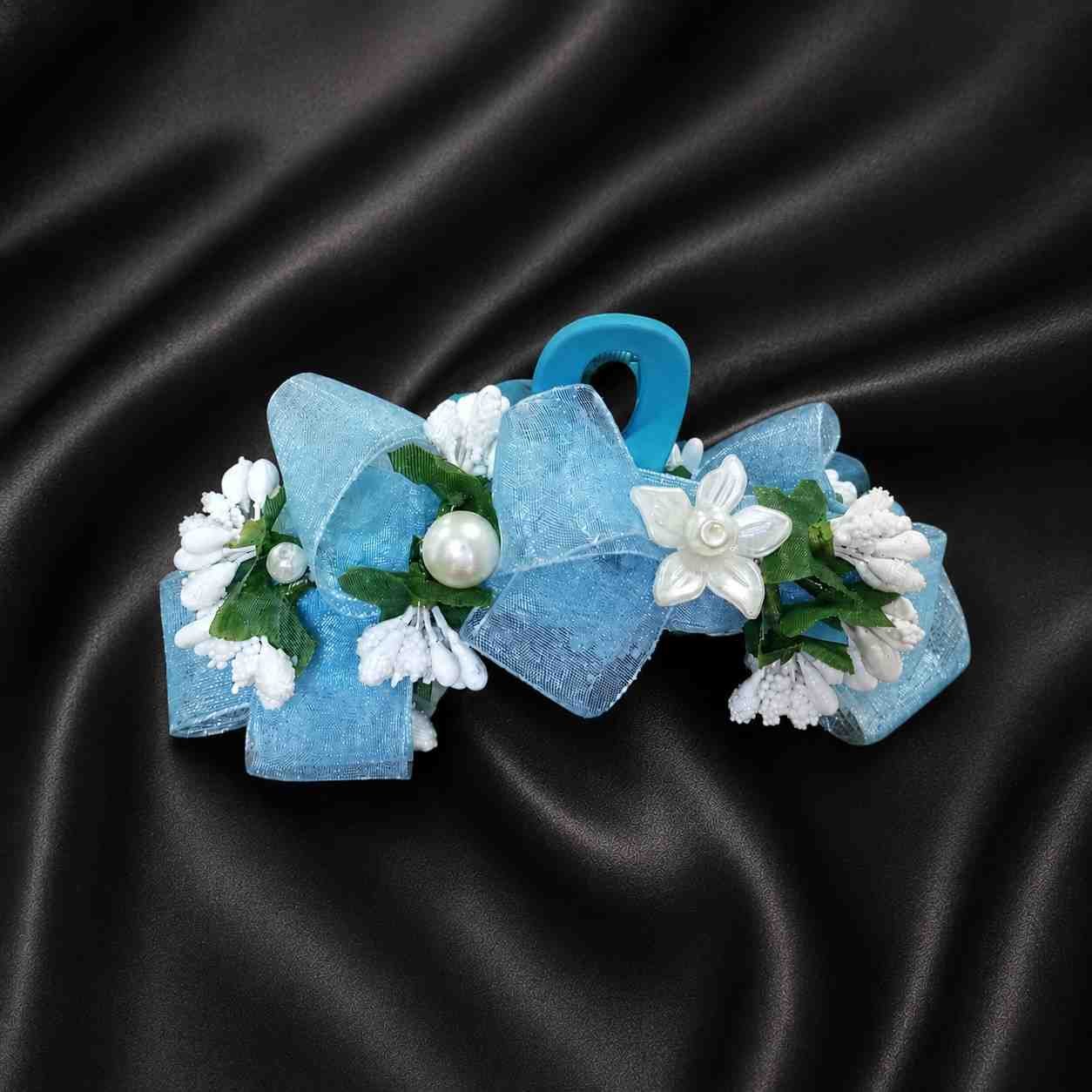 Handcrafted claw hair clip with elegant ribbon and pearl details
